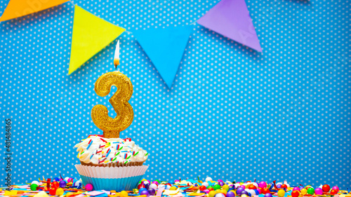 Postcard with the number 3 for any holiday or anniversary. Happy birthday cupcake cream with number three copy space. happy birthday background decoration