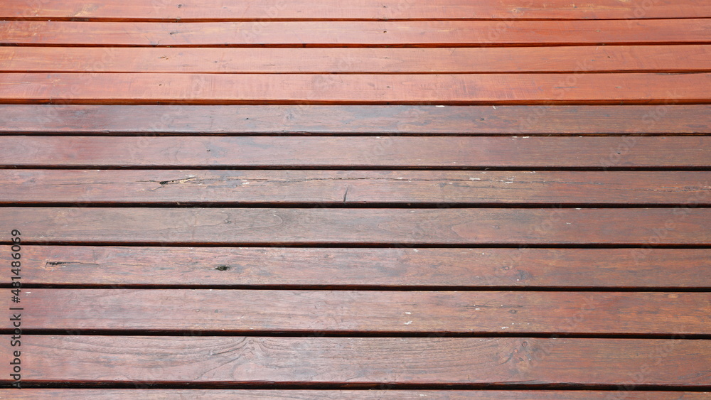 Fototapeta premium Brown wooden plank floor arranged horizontally