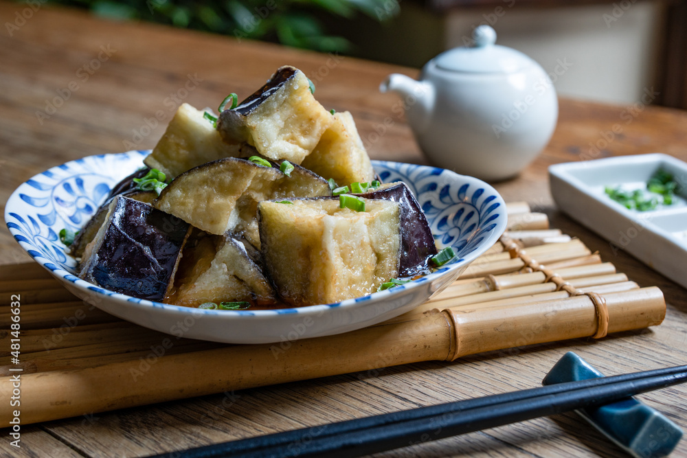 Japanese tempura style deep fried eggplant. Stock Photo Adobe Stock