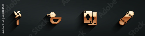 Set Pinwheel toy, Rubber duck, Playing cards and Skateboard icon with long shadow. Vector