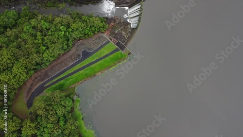 Horizontal flight over a dam edge and dam waterfall