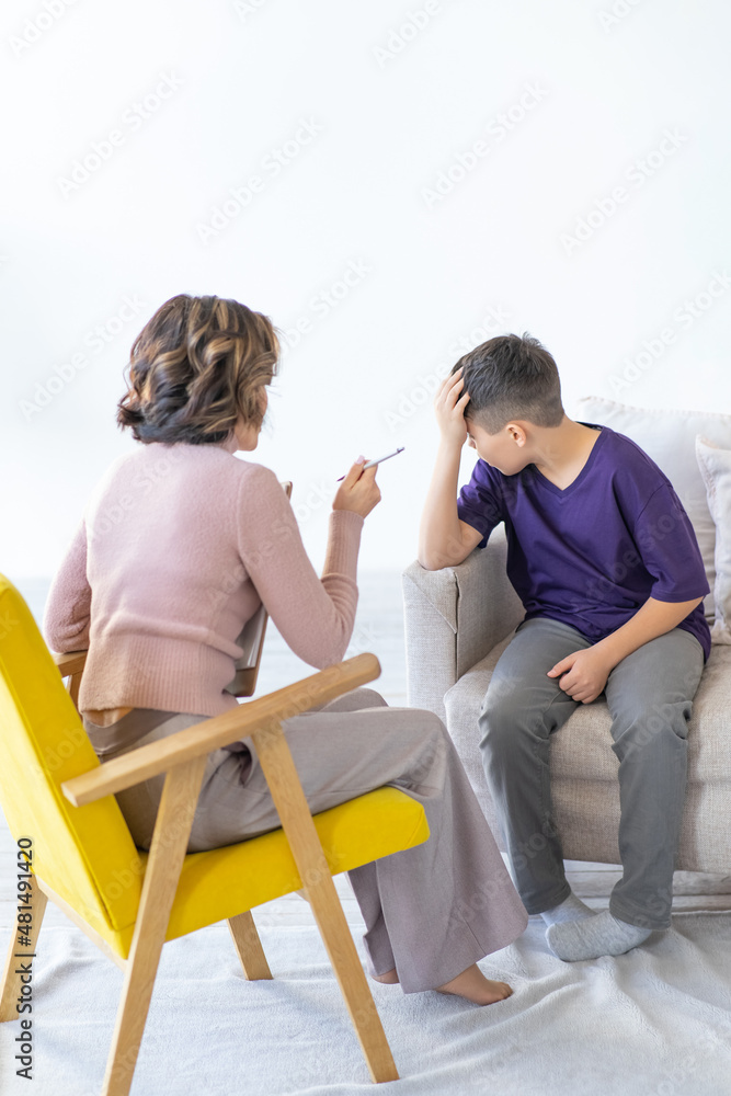 Woman conducts an explanatory conversation with a difficult teenager. School psychologist. Woman conducts an explanatory conversation with a difficult teenager. School psychologist.