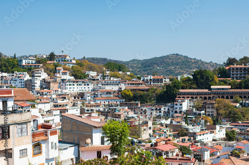 Taxco City, Mexico. The magical town, famous for the production of silver. Colonial houses on the hill. © PriscaLaguna