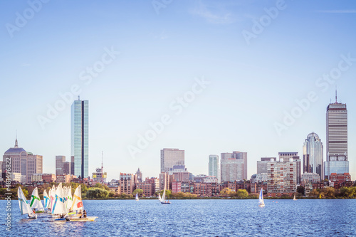 Sailing boats on a Charles River with view of Boston skyscrapers