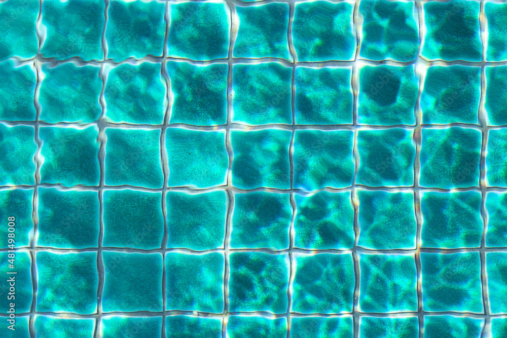 Green ceramic tiles in the swimming pool.