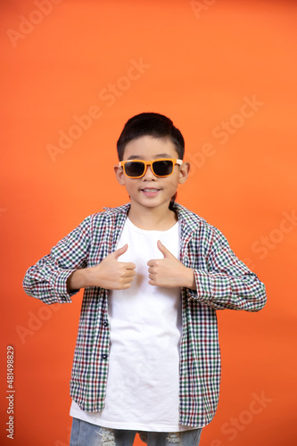 Happy boy showing like with his hands