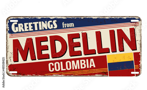 Greetings from Medellin vintage rusty metal plate