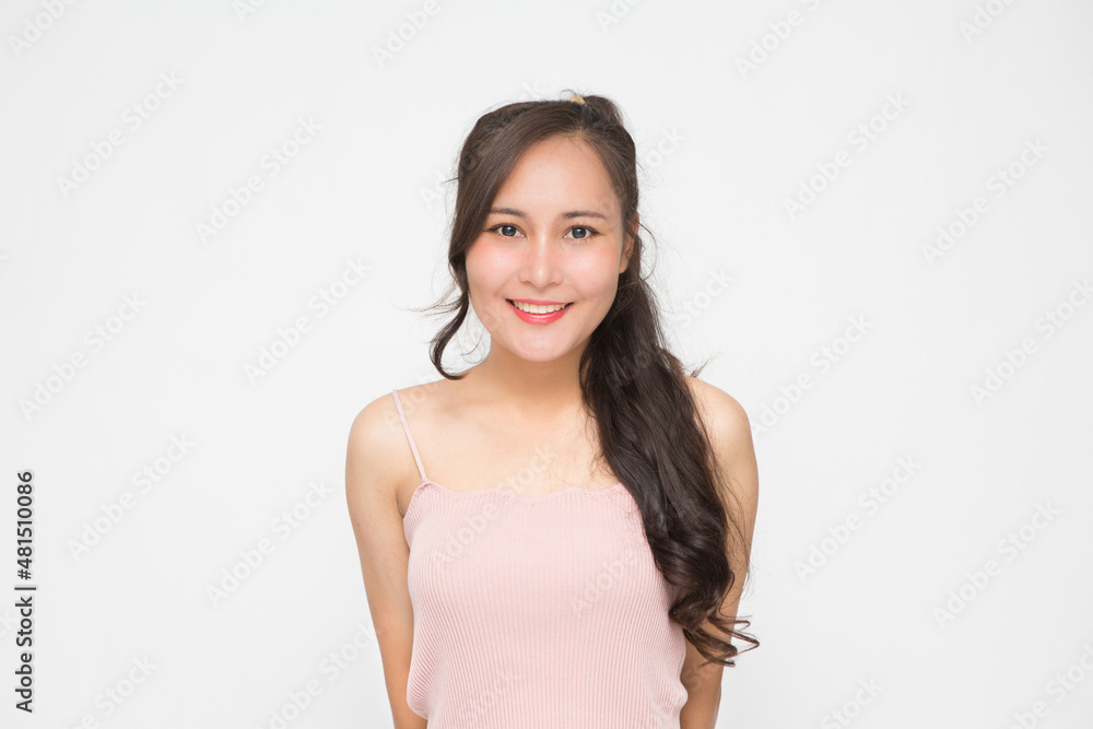 Beautiful Asian woman wearing pink casual shirt on white background and copy space.Cute Asian woman smiling and cheerful Beautiful Asian woman wearing pink casual shirt on white background and copy space.Cute Asian woman smiling and cheerful