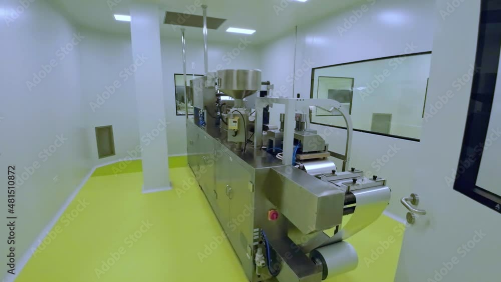 Revealing Shot Of A Modern Machinery Inside A Clean Laboratory. drone shot Revealing Shot Of A Modern Machinery Inside A Clean Laboratory. drone shot