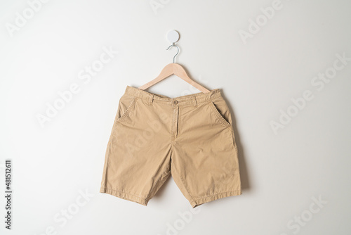 Foto short pants hanging on wall
