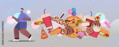 senior african american woman running away from junk food unhealthy nutrition junkfood addiction stop fast food