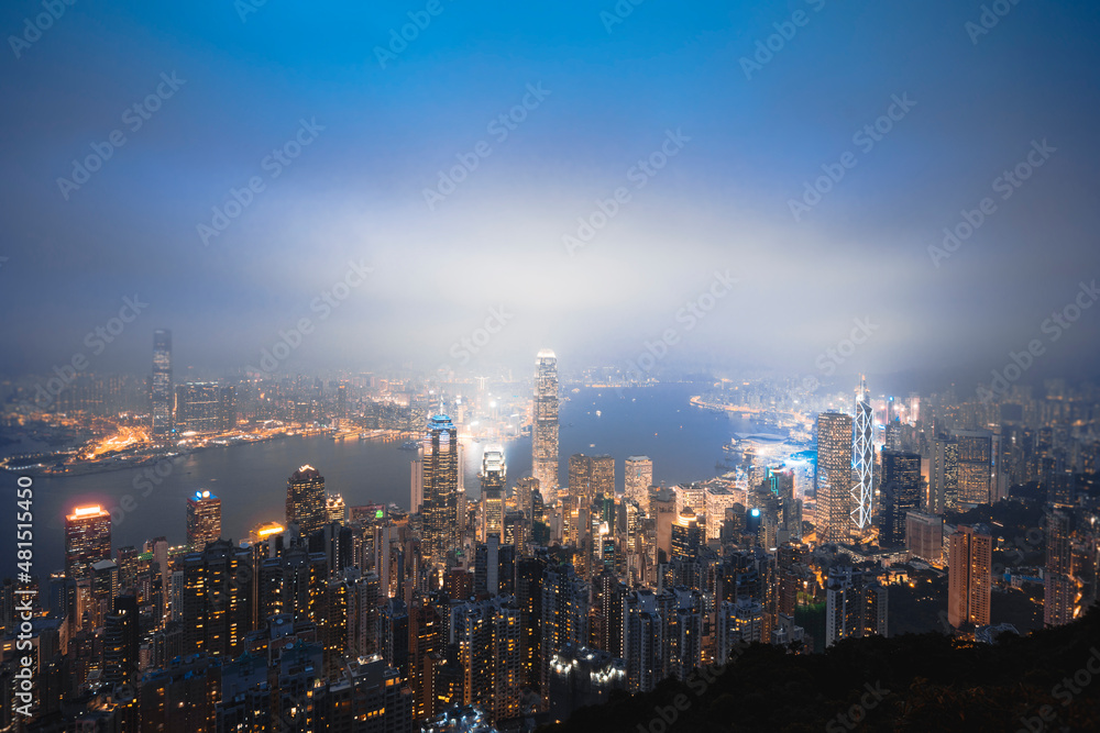 A view of the city at night from the top of the Taiping mountain in Hong Kong.