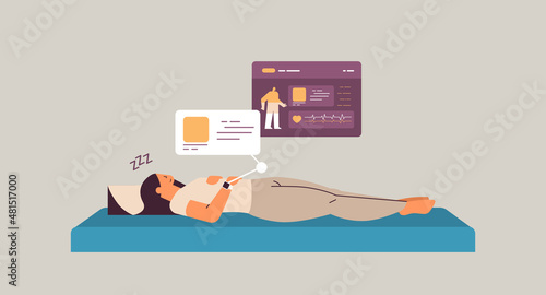 woman sleeping in bed with electronic smart watch app tracker on hand quality and quantity sleep control concept