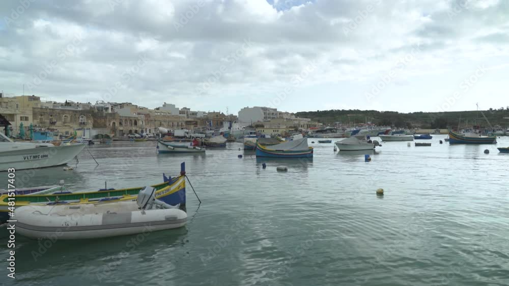 Traditional Fishing Boats Decorated with Osiris Eyes in the Harbour of Marsaxlokk Traditional Fishing Boats Decorated with Osiris Eyes in the Harbour of Marsaxlokk