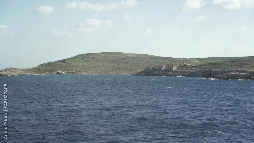Sailing Past Comino Island on a Windy Day in Malta Sailing Past Comino Island on a Windy Day in Malta