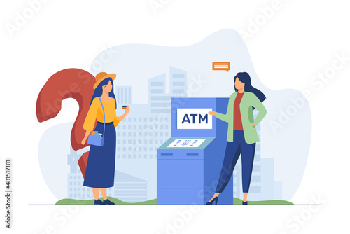 Bank worker helping customers to use ATM