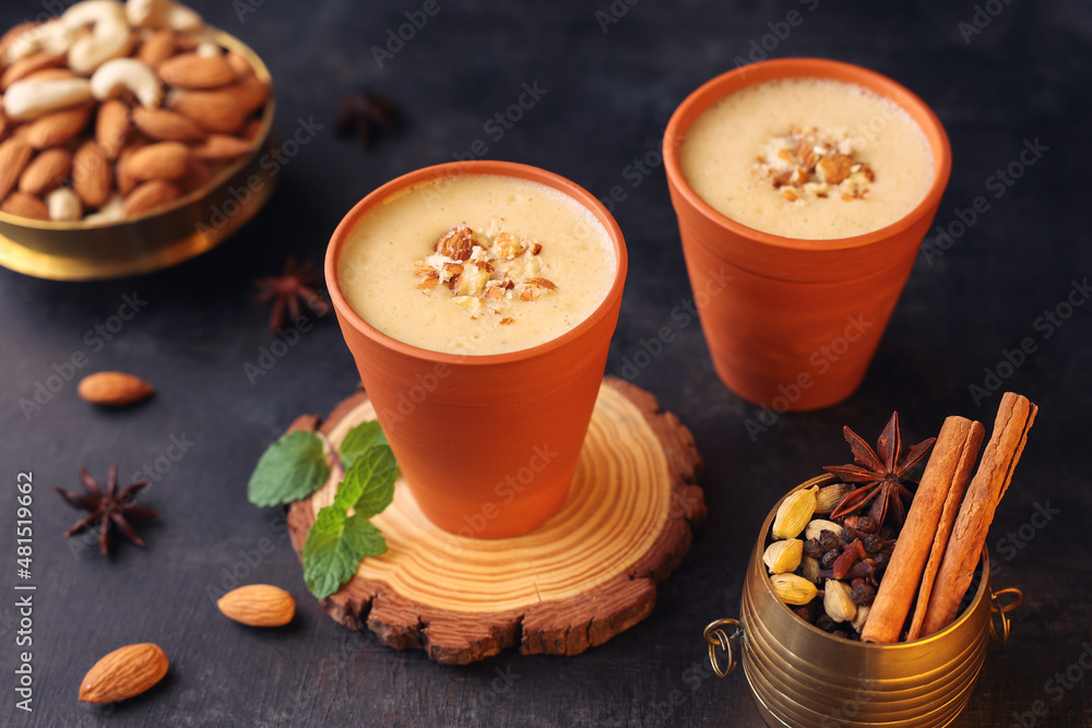 Kesar Badam milk shake Almond Saffron milk serving smoothie terracotta