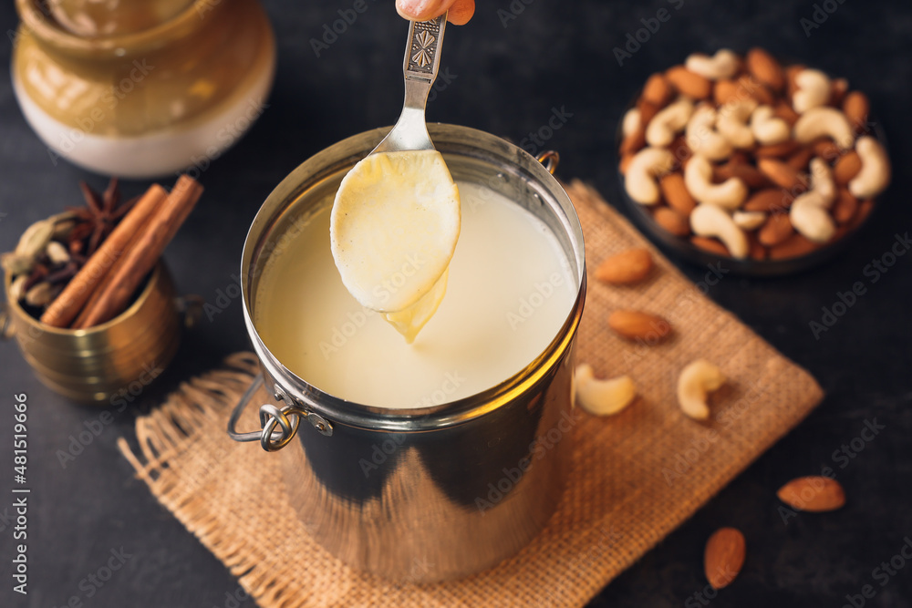 White thick layer of form over milk. Separate thick cream from milk