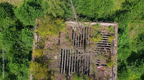 Ruined lost overgrown mining ghost town Akarmara, consequences of war in Abkhazia, aerial view from drone photo