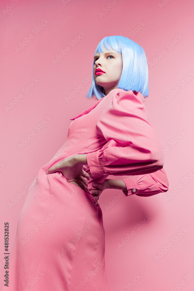 fashionable woman wears a blue wig makeup pink background fashionable woman wears a blue wig makeup pink background