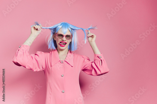 fashionable woman bright makeup fashion sunglasses pink background