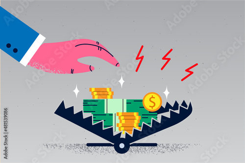 Businessman risk taking money from trap