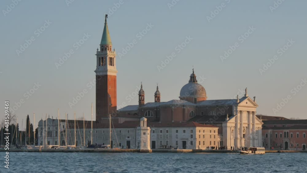 Church of San Giorgio Maggiore in Venice impressive view of the basilica, the church tower, and the palace. The famous church in Venice Italy during the sunset Church of San Giorgio Maggiore in Venice impressive view of the basilica, the church tower, and the palace. The famous church in Venice Italy during the sunset
