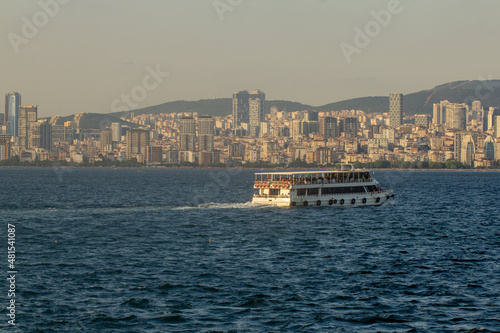 City ferry going from the Adara Islands against the background of the evening Stanbul, Turkey, Istanbul, Buyukada © Artyom