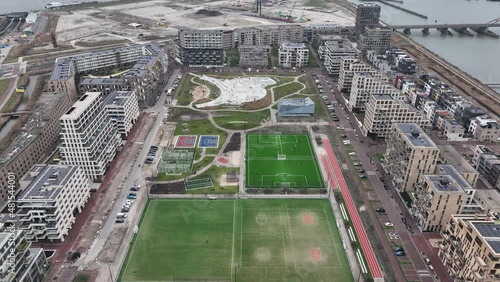 Zeeburg Skate Park and sports field playground for children in Amsterdam, Zeeburgereiland and Nieuwe Diep, The Netherlands. Aerial drone overview. photo