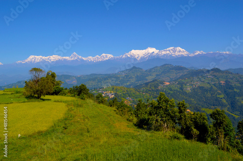 A beautiful landscape of mountain range of Annapurna and Fishtail along with the various hills was seen from Rupa rural village of Kaski District, Nepal.