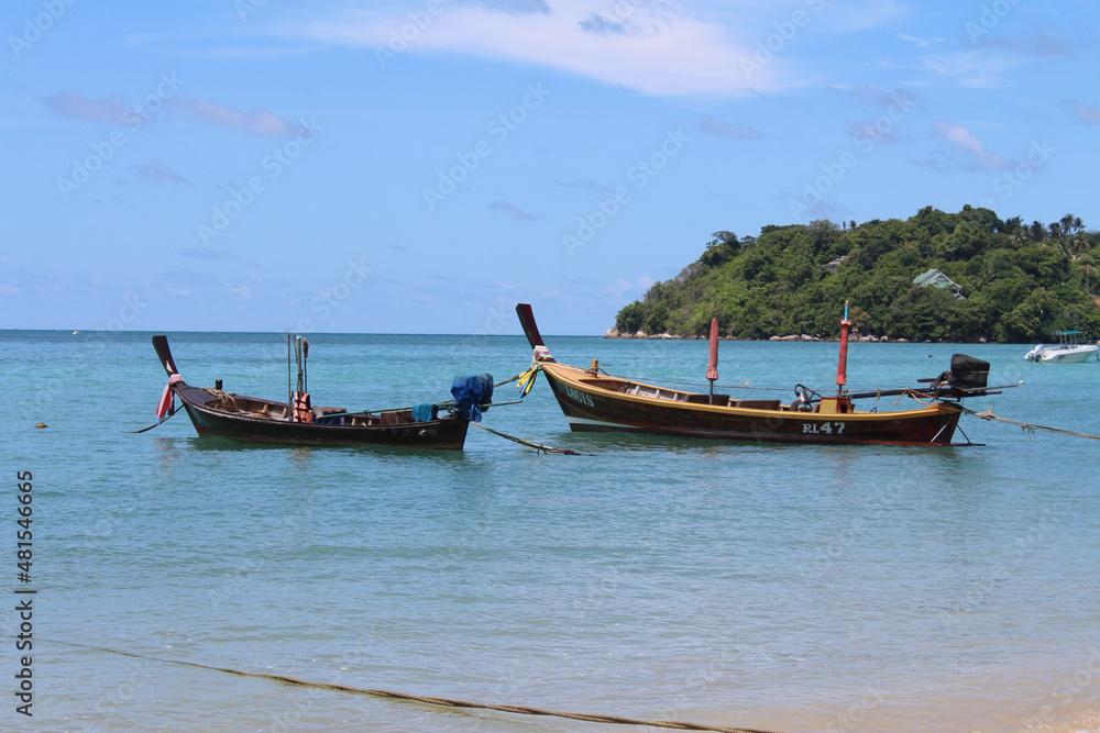 Longtail boats on Thai beach