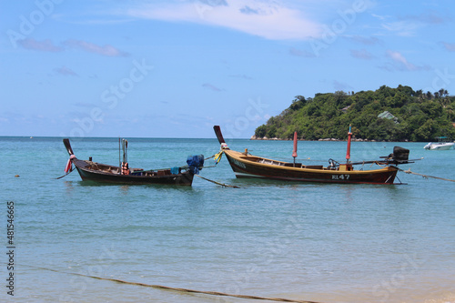 Longtail boats on Thai beach © carlene