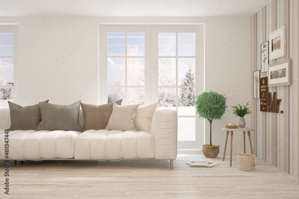 Fototapeta premium White living room with sofa and winter landscape in window. Scandinavian interior design. 3D illustration