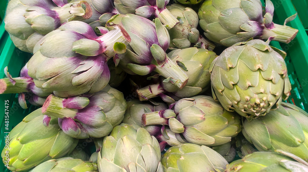 Fototapeta premium Fresh artichokes market, healthy food