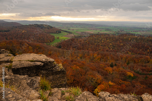 Magnificent panoramic view over an autumnal forest landscape, seen from the Hohenstein rock plateau, Süntel, Weser Uplands, Lower Saxony, Germany