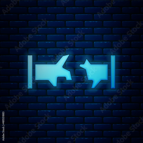 Glowing neon Broken metal pipe with leaking water icon isolated on brick wall background. Vector