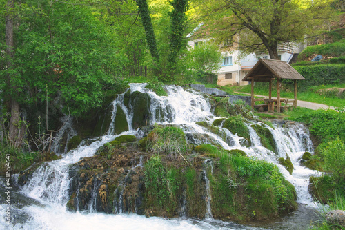 The might of nature - waterfalls of the beautiful mountain river Una in Martin Brod village of Bosnia and Herzegovina photo