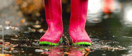 Child in rubber boots