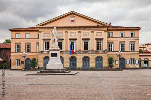 Lucca, Tuscany, Italy: the ancient Theater of the Giglio (Teatro del Giglio), historic city theater and opera house, and the statue of Giuseppe Garibaldi