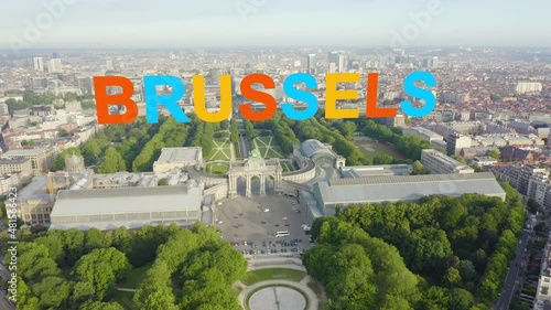 Inscription on video. Brussels, Belgium. Park of the Fiftieth Anniversary. Park Senkantoner. The Arc de Triomphe of Brussels (Brussels Gate). Different colors letters appears behind small squares, Ae photo