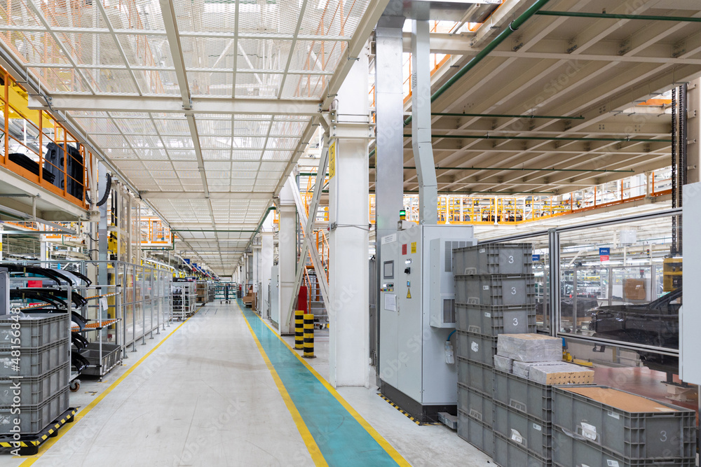 Factory for production of cars. Modern automotive industry. Interior of plant Factory for production of cars. Modern automotive industry. Interior of plant