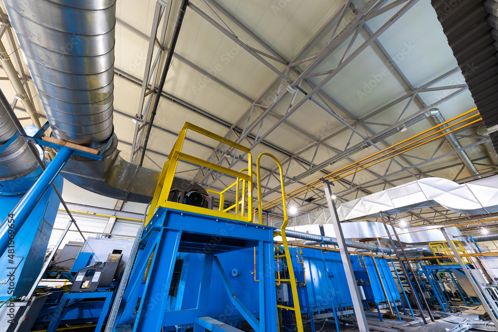 Photo shot of rolls of steel sheet stored in warehouse; Cold rolled steel coils at the factory. Engineering production