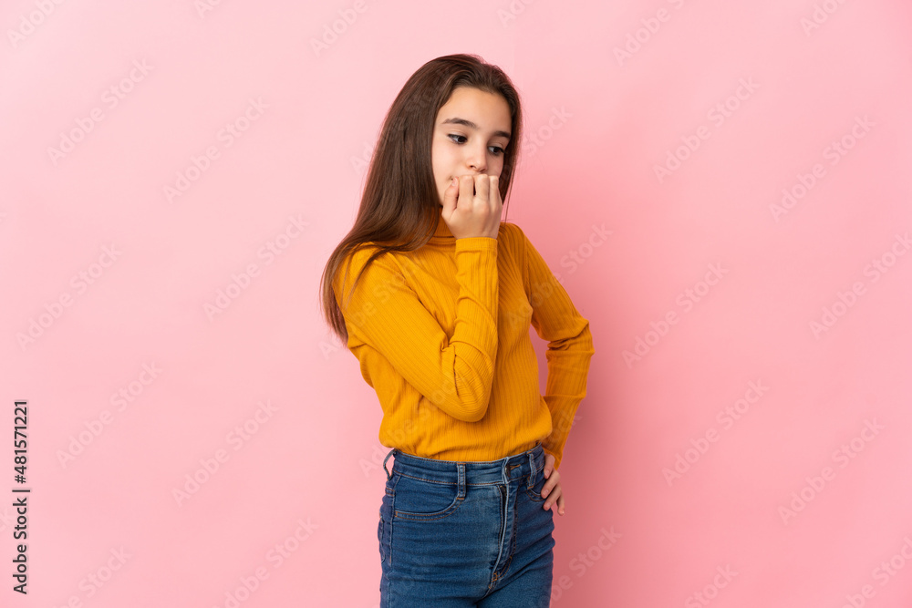 Little girl isolated on pink background having doubts Little girl isolated on pink background having doubts