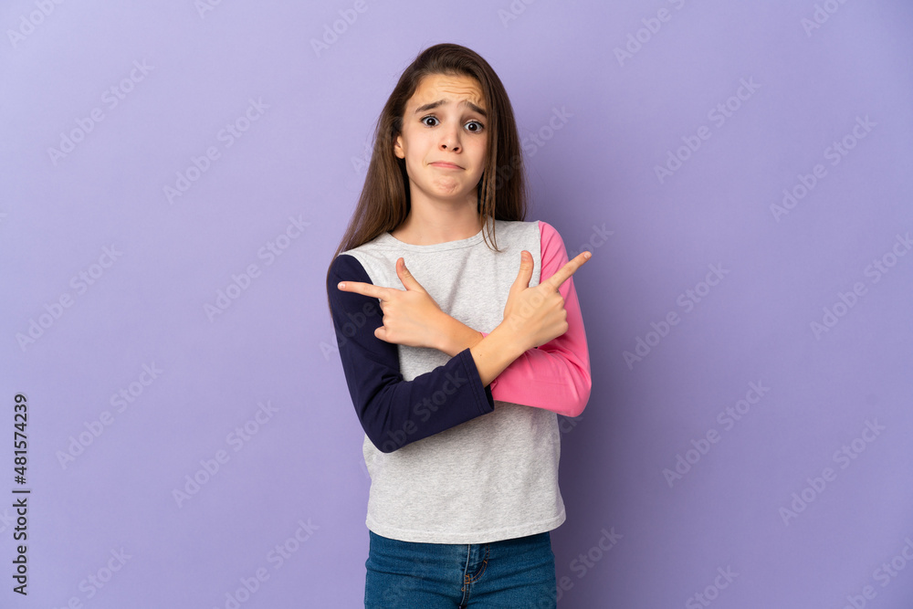 Little girl isolated on purple background pointing to the laterals having doubts Little girl isolated on purple background pointing to the laterals having doubts