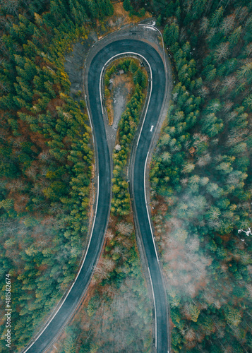 Tableau sur toile Serpentine roads in Ukraine, fog in the mountains, serpentine road in the fog, drove on top of the road
