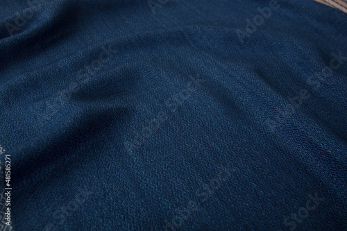 Close up of texture of hand woven shawl, Thai cotton indigo dyed 