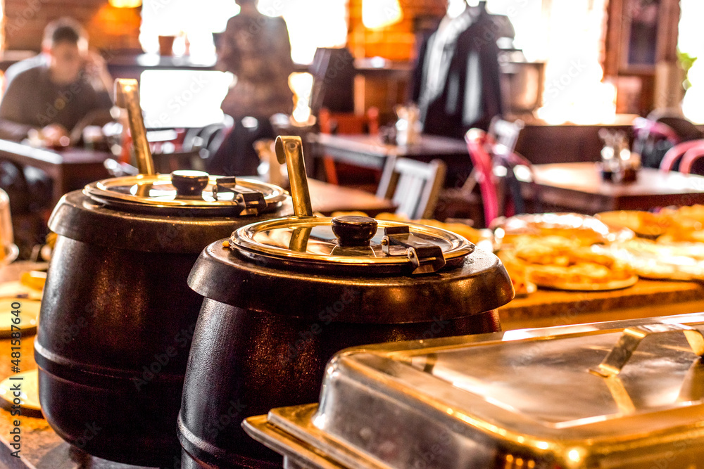 soup heated pots with ladle in cafe soup heated pots with ladle in cafe