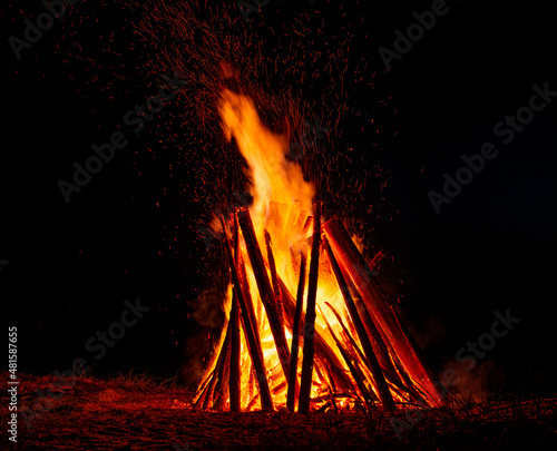 Big bonfire against dark night sky