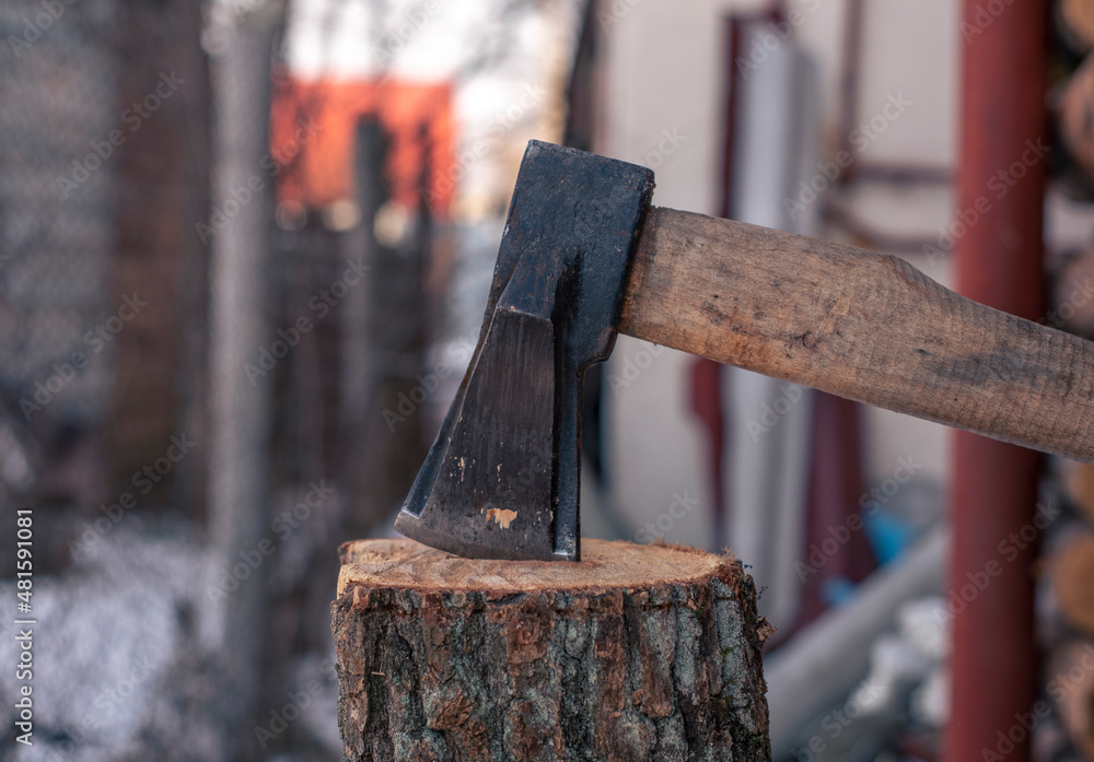 Ax on the background of a brick wall Ax on the background of a brick wall