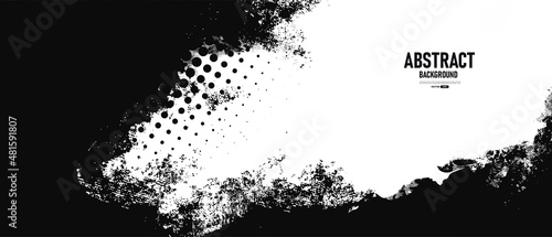 Black and white abstract grunge background with halftone style.
